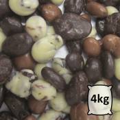 Bouchées au chocolat blanc, noir, lait, fourrées aux raisins bio