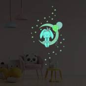 Ambiance-sticker - Sticker phosphorescent lumineux - lapin assis sur la lune et 30 étoiles - Autocollant mural plafond enfant fluorescent - 30x30cm