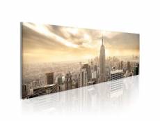 Tableau villes new york city among the clouds taille 135 x 45 cm PD12234-135-45