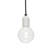 Lampe en verre blanc avec ampoule et fil noir
