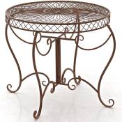 Table ronde avec un style romantique orné de différentes décorations de couleurs colore : antique brun