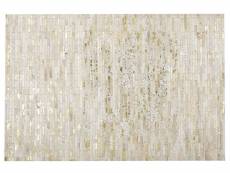 Tapis patchwork en cuir beige et doré 140 x 200 cm