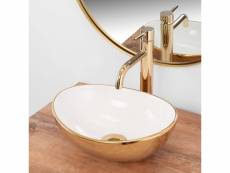 Une vasque à poser blanche-dorée en céramique 34 cm