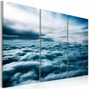 Artgeist - Tableau nuages denses - 60 x 40 cm - Bleu