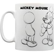 Une tasse blanche de Walt Disney avec imprimé Mickey