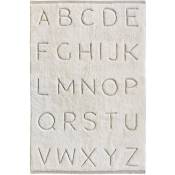 Thedecofactory - kids abc - Tapis 100% coton motif alphabet cisaillé-relief naturel 100x150 - Beige