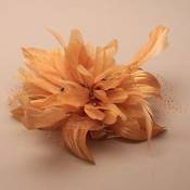 Gold Feather flower fascinator on a clear comb by Generic